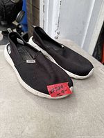 Full view of both shoes from side/front
