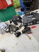 Two controllers, AV cable, power cord with console