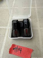 Pair of mobile game triggers in plastic box