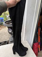 Full view of one boot showing height and heel style