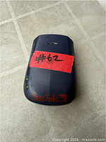 Top view of SanDisk ImageMate SDDR-75 showing LEDs, slot and logo