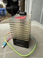 Front angled view of SoundLogic XT speaker with braided charging cable