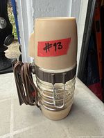 Full view of coffee maker showing overall design and condition