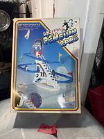 Front of Playful Penguin Race box showing battery-operated toy illustration
