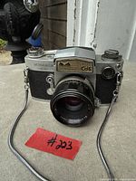Front view of Miranda Autonex III camera showing lens, CdS meter, strap