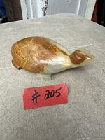 Top view of the carved onyx turtle figurine showing color, form and overall condition