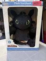 Front view of boxed Zoobies Toothless plush dragon