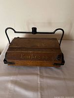 Front view showing Empress gold stencil and metal bail bracket