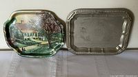 Both trays side by side showing relative sizes and designs