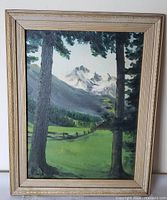 Full view of framed painting showing artwork and frame