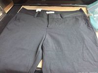 Full view of front of black Old Navy flare pants