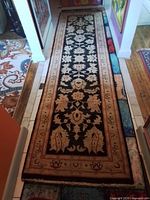 Full view of entire runner rug along hallway floor