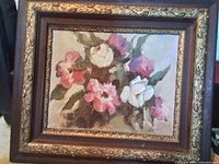Framed oil painting showing full frame and artwork