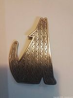 Front view showing chevron pattern and silhouette