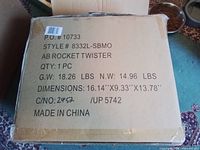 Factory carton displaying model, weight and dimensions