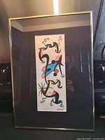 Full view of framed artwork