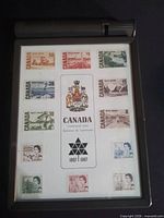 Front view showing 12 stamps, crest, centennial logo and water dispenser
