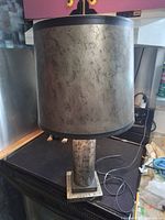 Full view of lamp showing shade, column and base