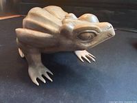 Left-front view of carved Suar wood frog