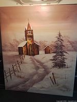 Full view of oil painting showing winter church scene, signature visible