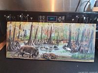 Full view of painting on stove backdrop