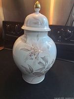 Full view of vase with lid showing shape and size