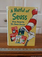 Front cover showing title, hat graphic, thumbnails of included stories
