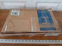 Front of closed retail box showing Fitueyes branding and model TT103701GB label