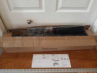 Box with wrapped components and instruction sheet