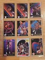 Binder page showing all eight sleeved cards