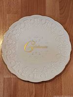 Front view of Lenox plate showing gold script and embossed border