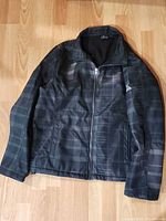Full front view of jacket laid flat