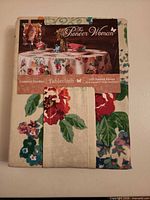 Front of packaged tablecloth showing design and branding