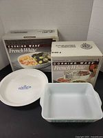 Two boxed Corning Ware French White bowls, Pyrex turquoise-pattern casserole, Corning blue Cornflower pie plate