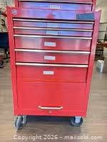 Front view of lower rolling cabinet showing drawers and casters