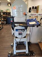 Full front view of Delta 28-276 bandsaw on mobile base
