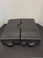 Closed black textured plastic case