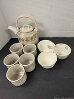 Teapot, five cups, three-bowl dish grouped