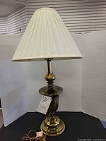 Full view of brass Westwood table lamp with shade
