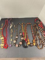All nine necklaces laid out for full view