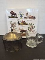 Group shot showing trinket box, cookie tin and glass mug