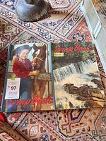 Both scrapbooks closed showing front covers