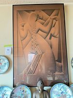 Full view of large framed Art Deco poster under glass