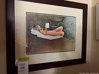 Full view of framed print on wall