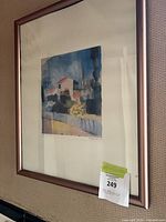 Framed print on wall showing full view