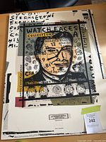 Full view of screen-printed poster showing portrait, typography and border graphics