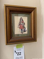 Front view of one gilded wood framed figurative print showing frame style, matting and artwork