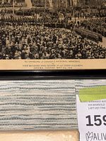 Close-up of printed caption detailing event, date and royal visit