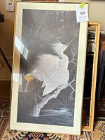 Full view of framed print showing artwork, frame, mat and glass
