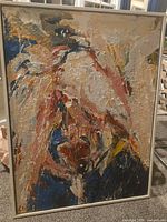 Full view of framed abstract painting showing entire composition and frame